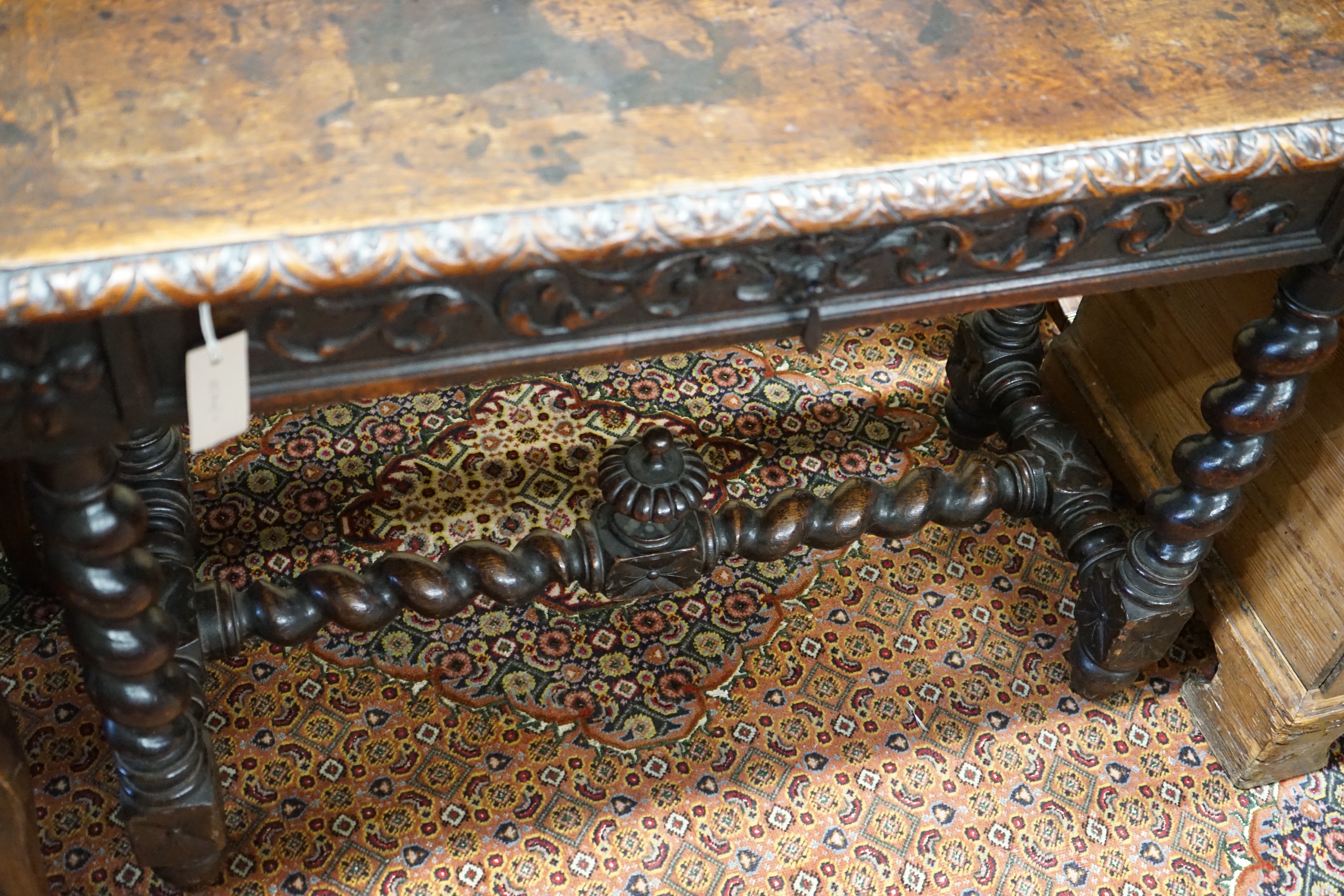 A late 19th century Flemish carved oak side table, width 100cm, depth 45cm, height 75cm
